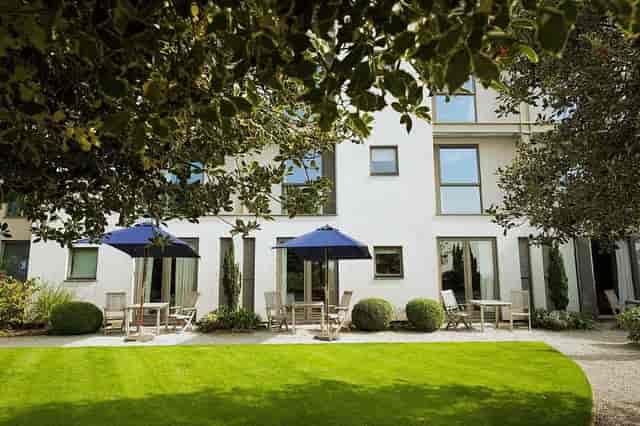 "Inviting outdoor courtyard at Hart's Hotel, perfect for networking events and breakout sessions."