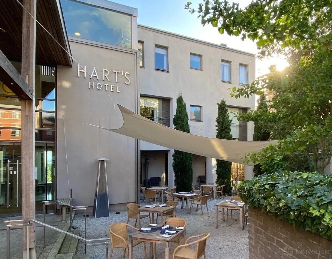 Hart's Hotel courtyard with modern design, outdoor seating for events and gatherings.