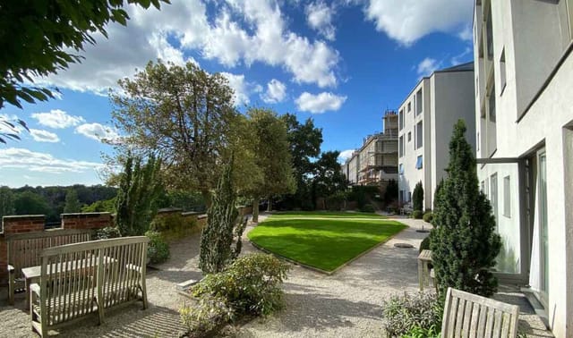 "Charming outdoor courtyard at Hart's Hotel, perfect for gatherings and events."