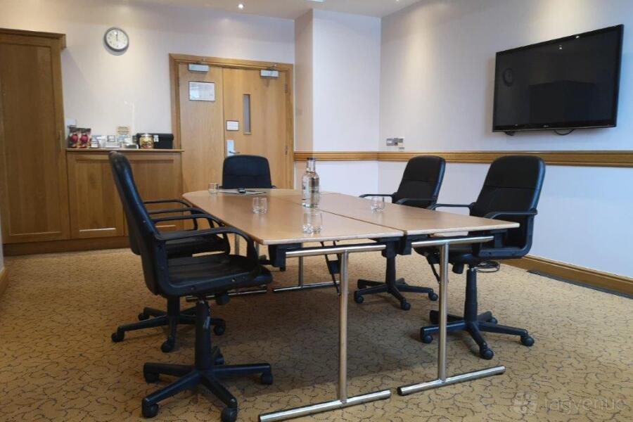 Private meeting room at Hart's Hotel, featuring ergonomic chairs for professional gatherings.