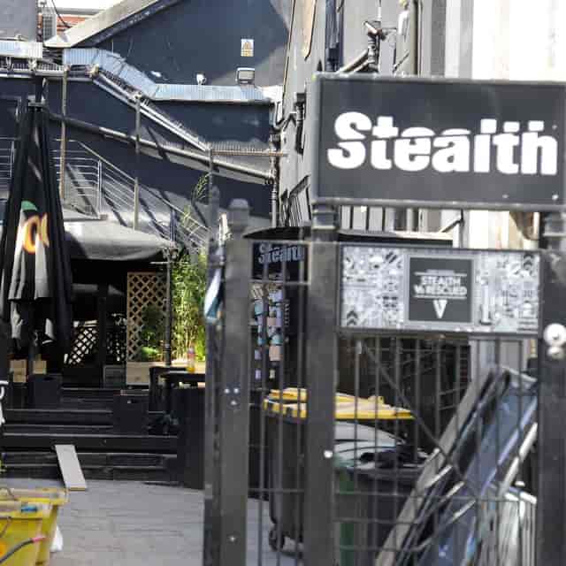 Urban venue entrance with industrial decor for creative events and gatherings.