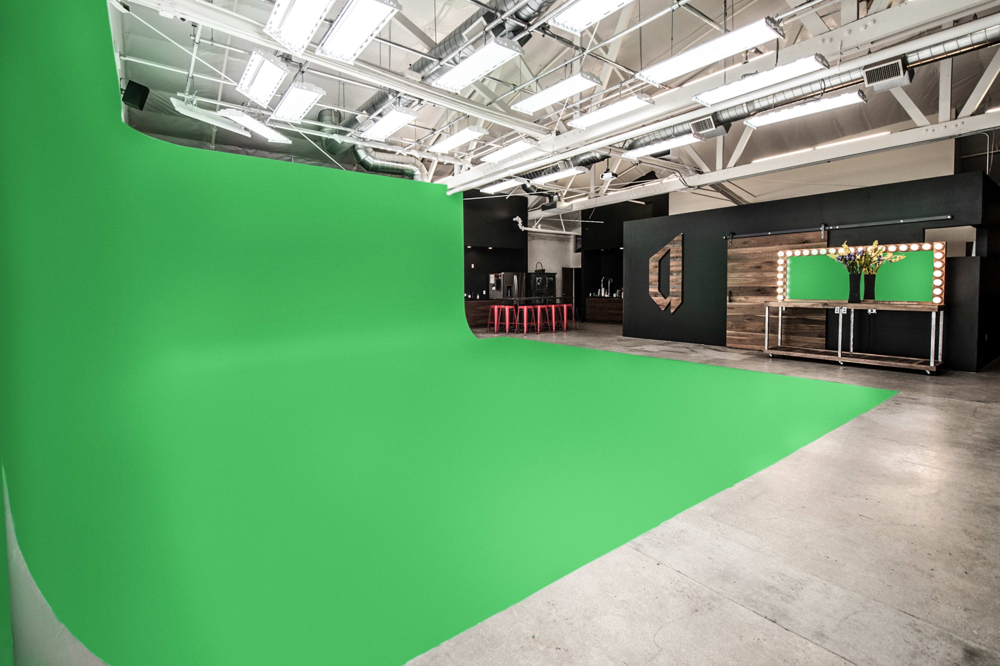 Versatile event space with green screen for hybrid events and networking in Stealth Room 2.
