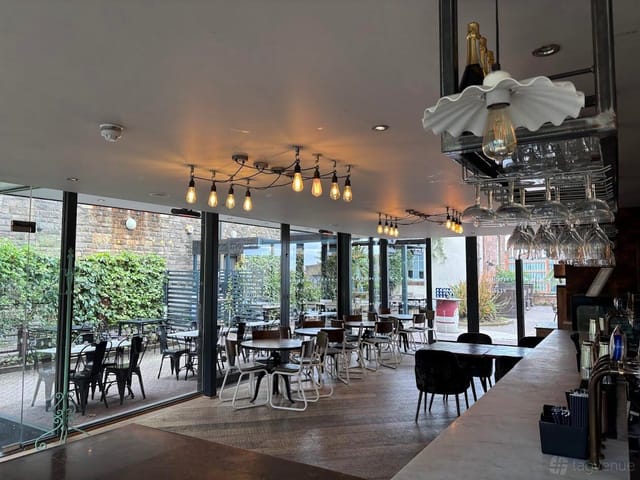 Terrace Bar at Pitcher & Piano: bright event space for gatherings and meetings.