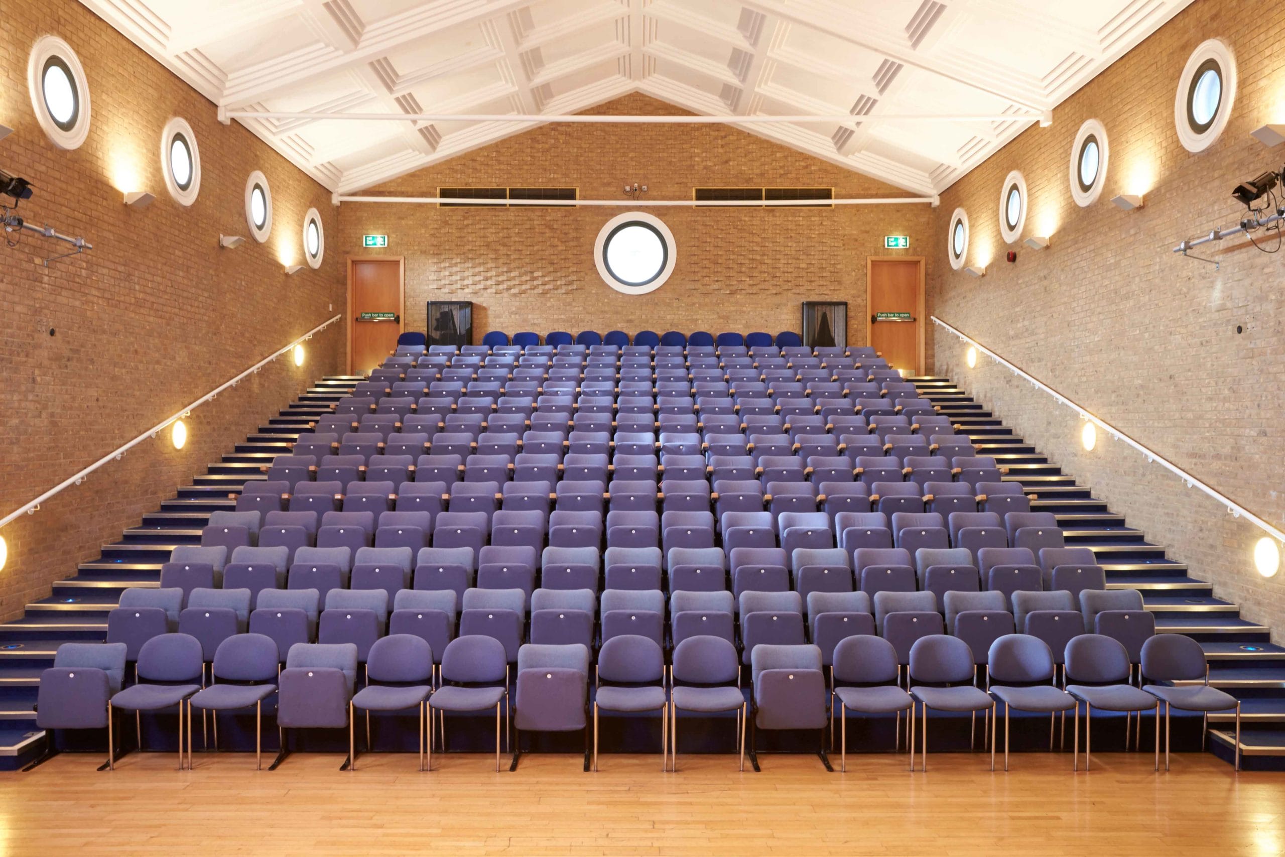 Recital Hall at Nottingham University with tiered seating for conferences and presentations.