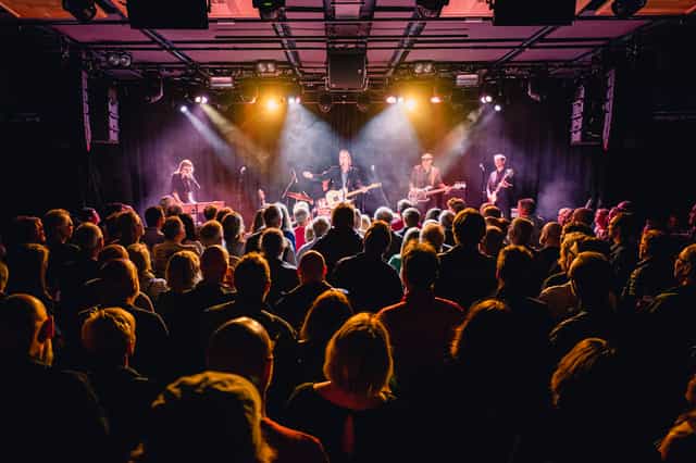 Main Stage at Metronome, vibrant concert with dynamic lighting and engaged audience.