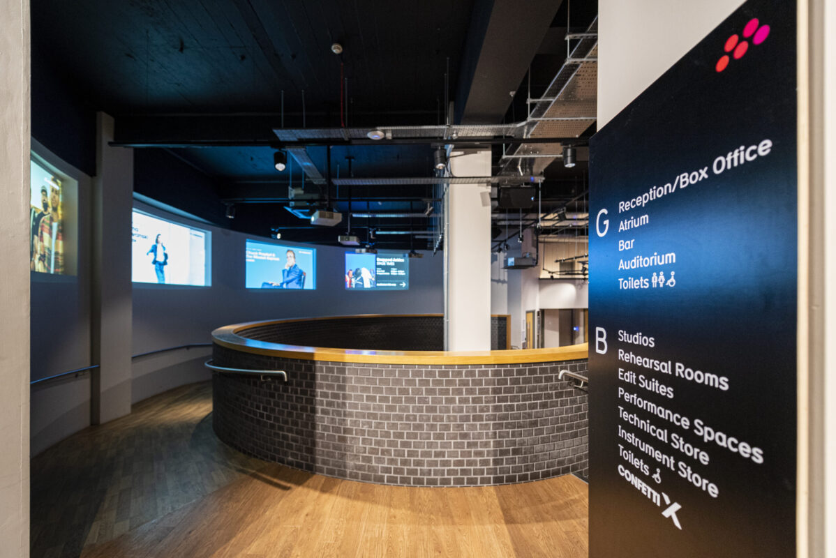 Modern Metronome venue with sleek design for meetings and events, ideal for multimedia presentations.