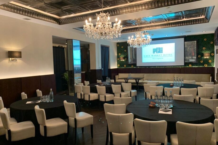 Sophisticated event space at Lace Market Hotel with elegant chandeliers for corporate retreats. - Banner