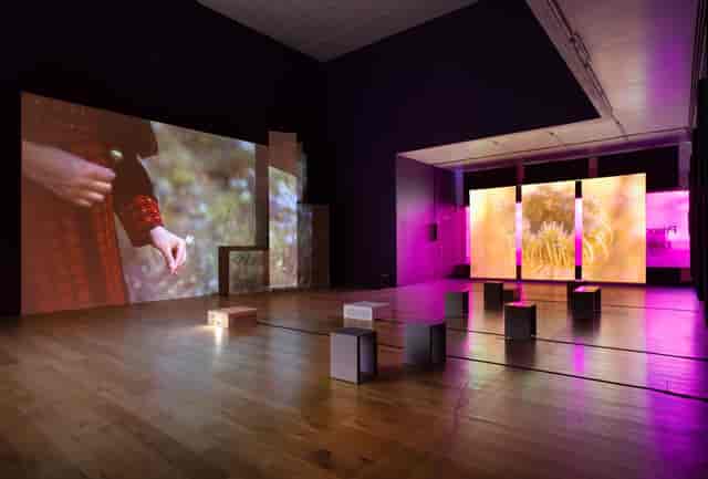 Modern event space at Nottingham Contemporary with vibrant projections for workshops.