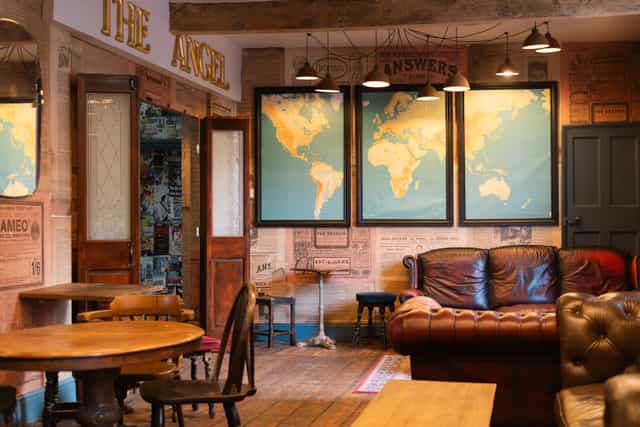 Cozy Downstairs Pub & Microbrewery with rustic decor for networking events and meetings.