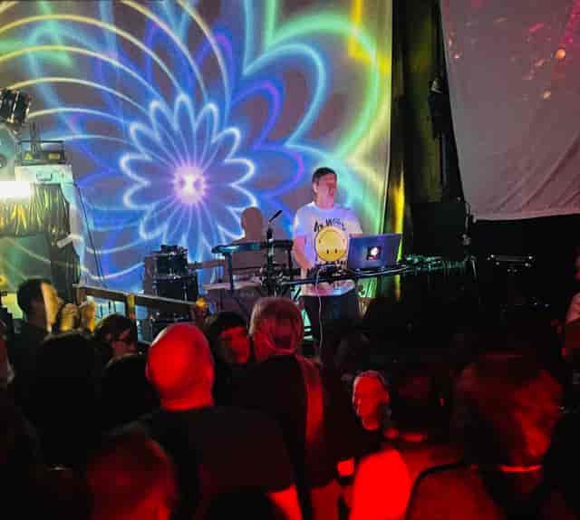 DJ performance at The Chapel, energetic nightlife event with vibrant lighting.