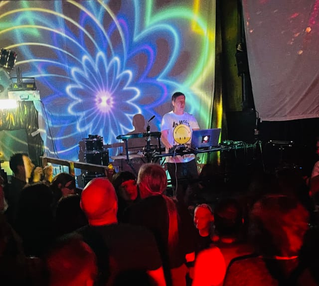 DJ performance at The Chapel, energetic nightlife event with vibrant lighting.