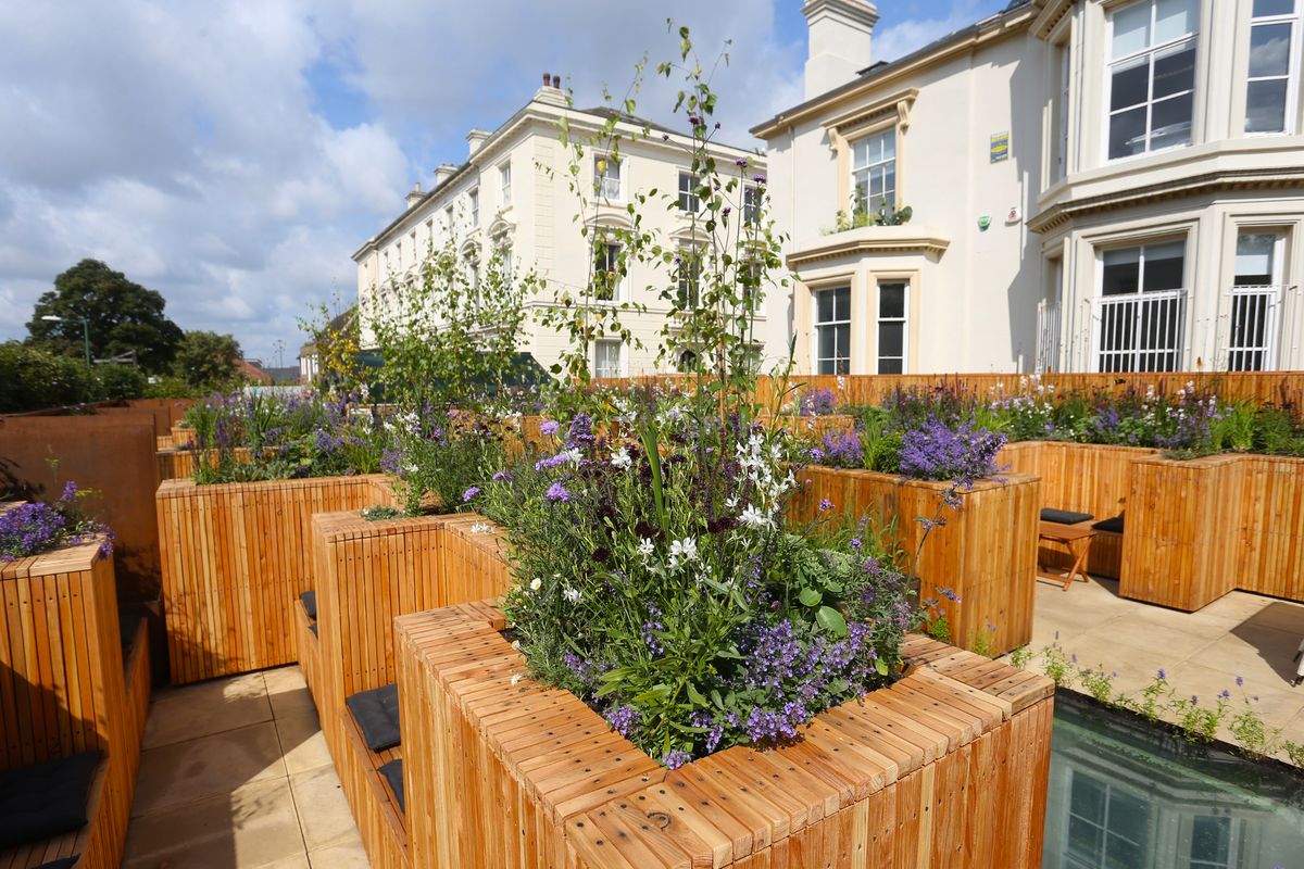 Hidden Rooftop Terrace garden at The Angel Microbrewery, ideal for networking events and meetings. - Banner