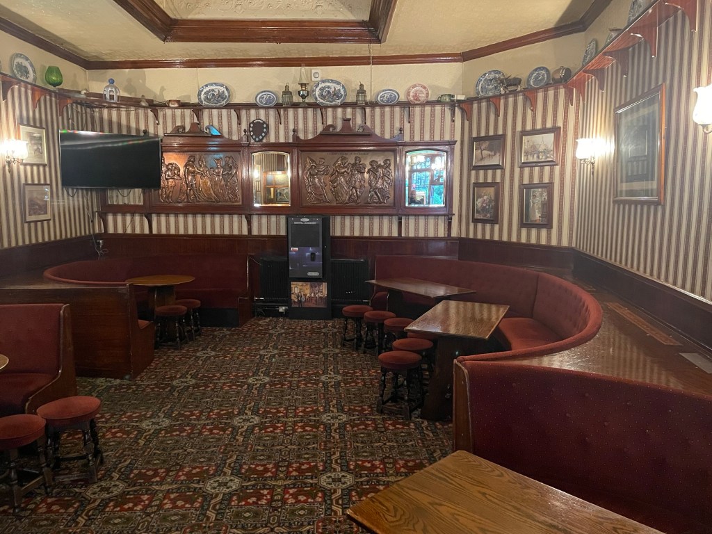 Cozy booth seating in Flynn's Room at The Bell Inn, perfect for team meetings or brainstorming.