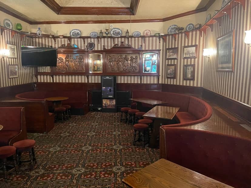 Cozy booth seating in Flynn's Room at The Bell Inn, perfect for team meetings or brainstorming.