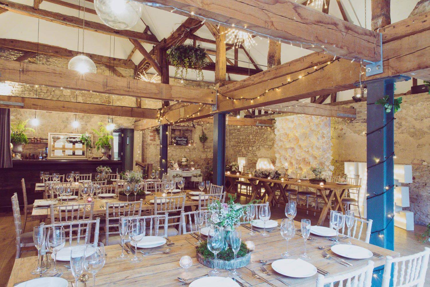 Rustic event space with wooden beams at The Crown Post Room, ideal for celebrations and gatherings. - Banner