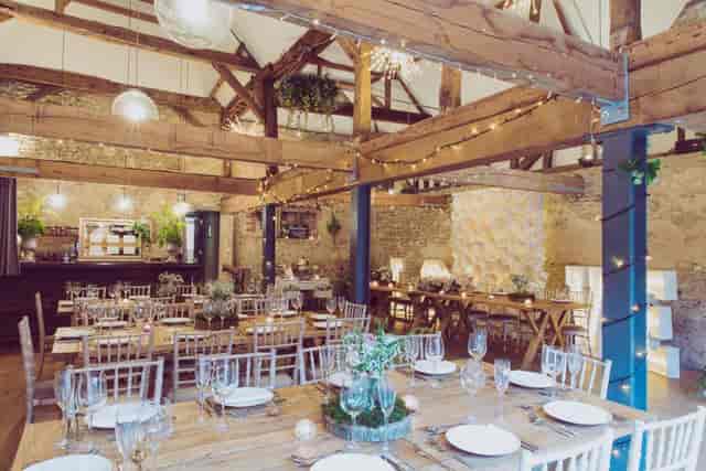 Rustic event space with wooden beams at The Crown Post Room, ideal for celebrations and gatherings.