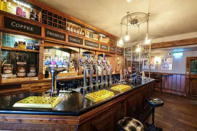 Stylish bar at The Belfry, ideal for networking events and informal gatherings.