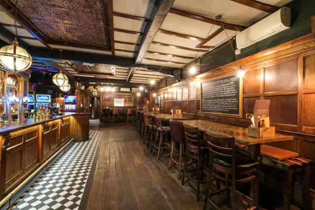 Spacious Belfry venue with rustic charm, ideal for networking events and receptions.