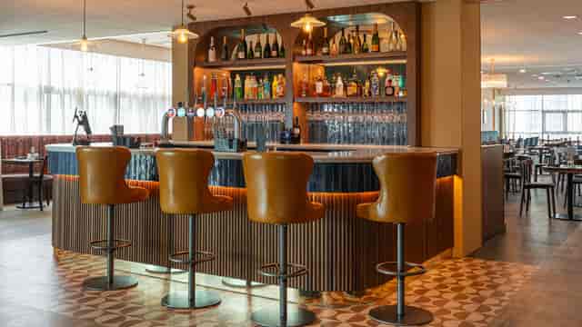 "Spotlight Bar at Motorpoint Arena: sleek design, inviting hub for events and networking."