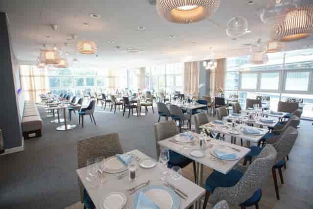 Modern event space at T&D Café, Nottingham; elegant dining setup for corporate gatherings.