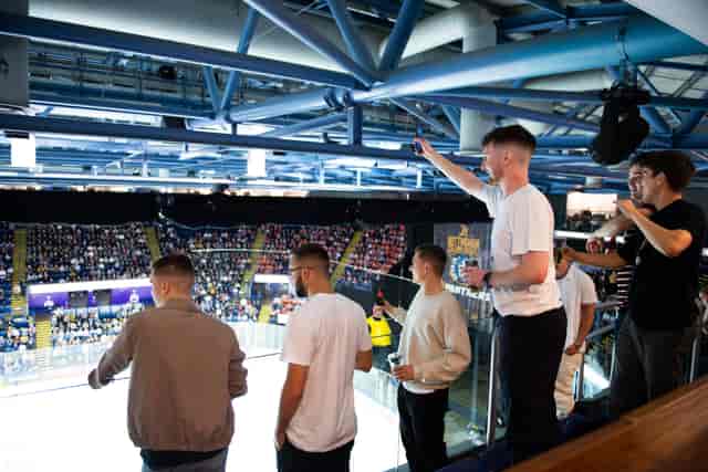 Lively crowd on balcony at Bolero Suite, Motorpoint Arena Nottingham event.