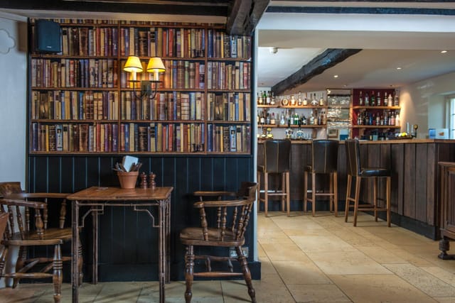 Cozy pub-style breakout space at The Slaughters Country Inn for networking and small events.
