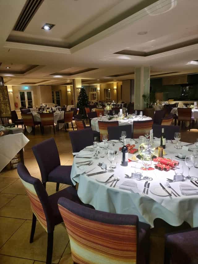 Terrace Suite at Sudbury House Hotel set for formal dinner and holiday celebrations.