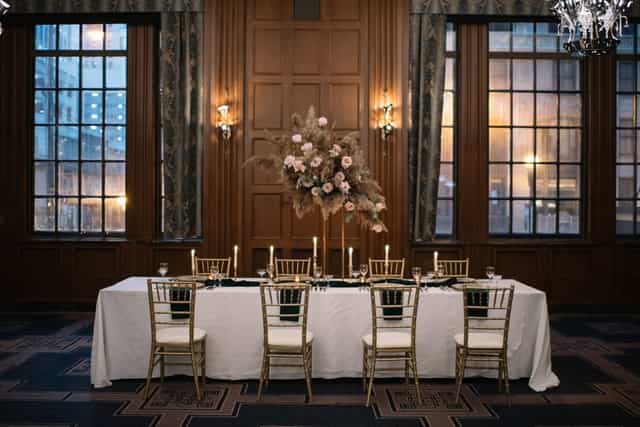 Elegant Grand Ballroom, Pendry Chicago - formal dining setup with floral arrangements.