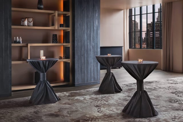 Kawa Ballroom cocktail reception with high-top tables, perfect for networking events and parties.