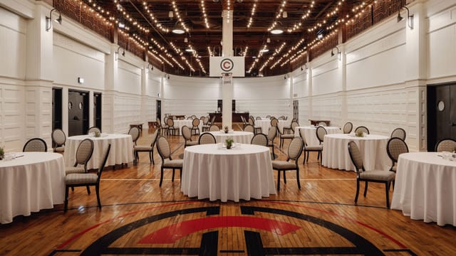 Stagg Court event space with elegant tables, ideal for meetings and receptions.