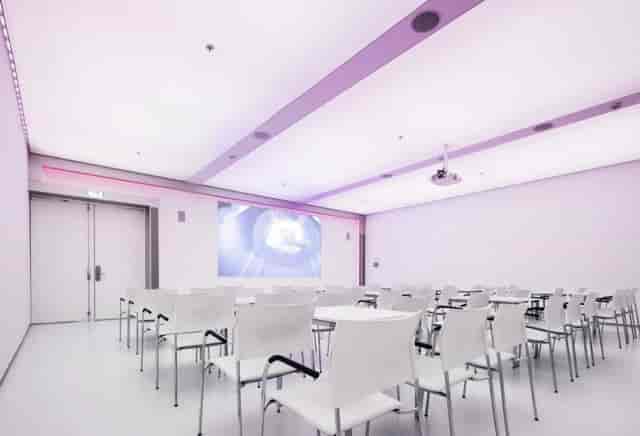Modern theater-style conference room at Royal Jaarbeurs for corporate presentations and events.