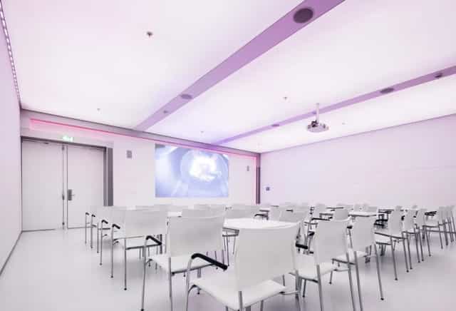 Modern theater-style conference room at Royal Jaarbeurs for corporate presentations and events.