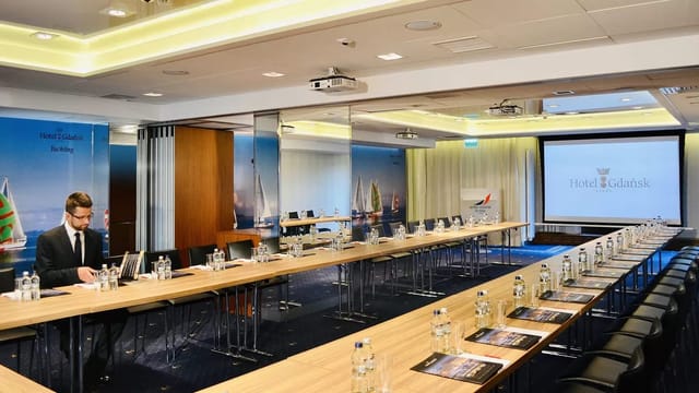 U-shape boardroom at Hotel Gdańsk for corporate meetings and professional collaborative events.