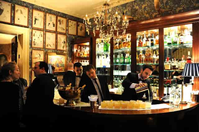 Upscale cocktail reception at Mark’s Club featuring premium beverage service for networking events.