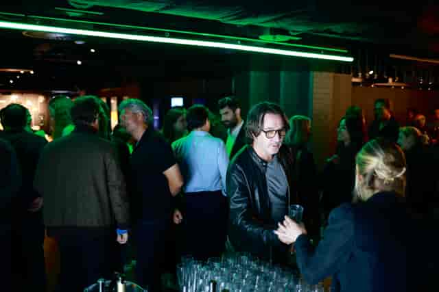 SPYSCAPE cocktail reception, green lighting, product launch, networking event