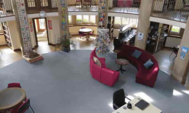 Weybridge Conference Room, spacious venue for meetings and workshops, featuring natural light.
