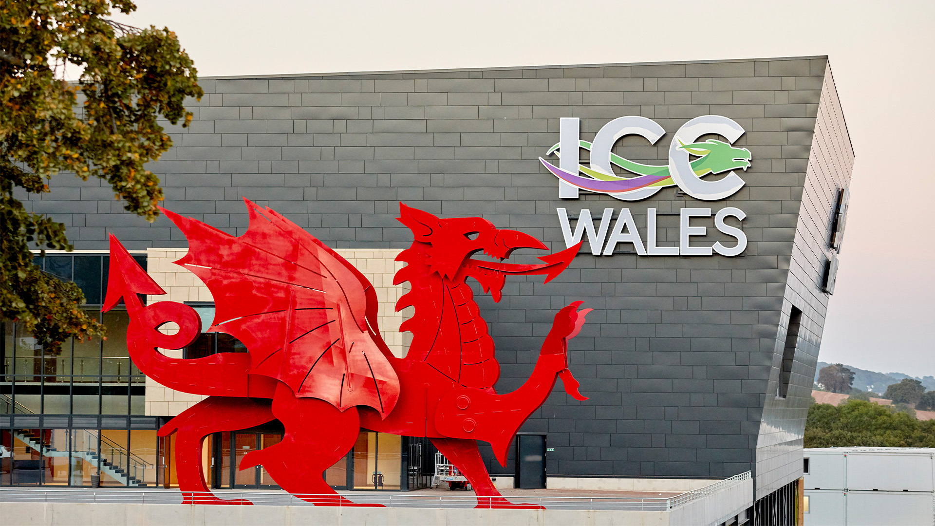 Whole Venue ICC Wales with red dragon sculpture, perfect for conferences and events. - Banner