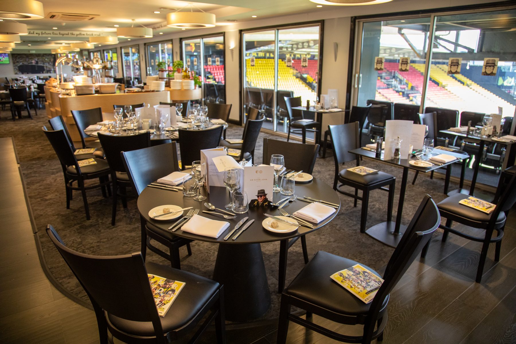 Elegant dining setup in Sir Elton John Suite, ideal for corporate events and meetings.