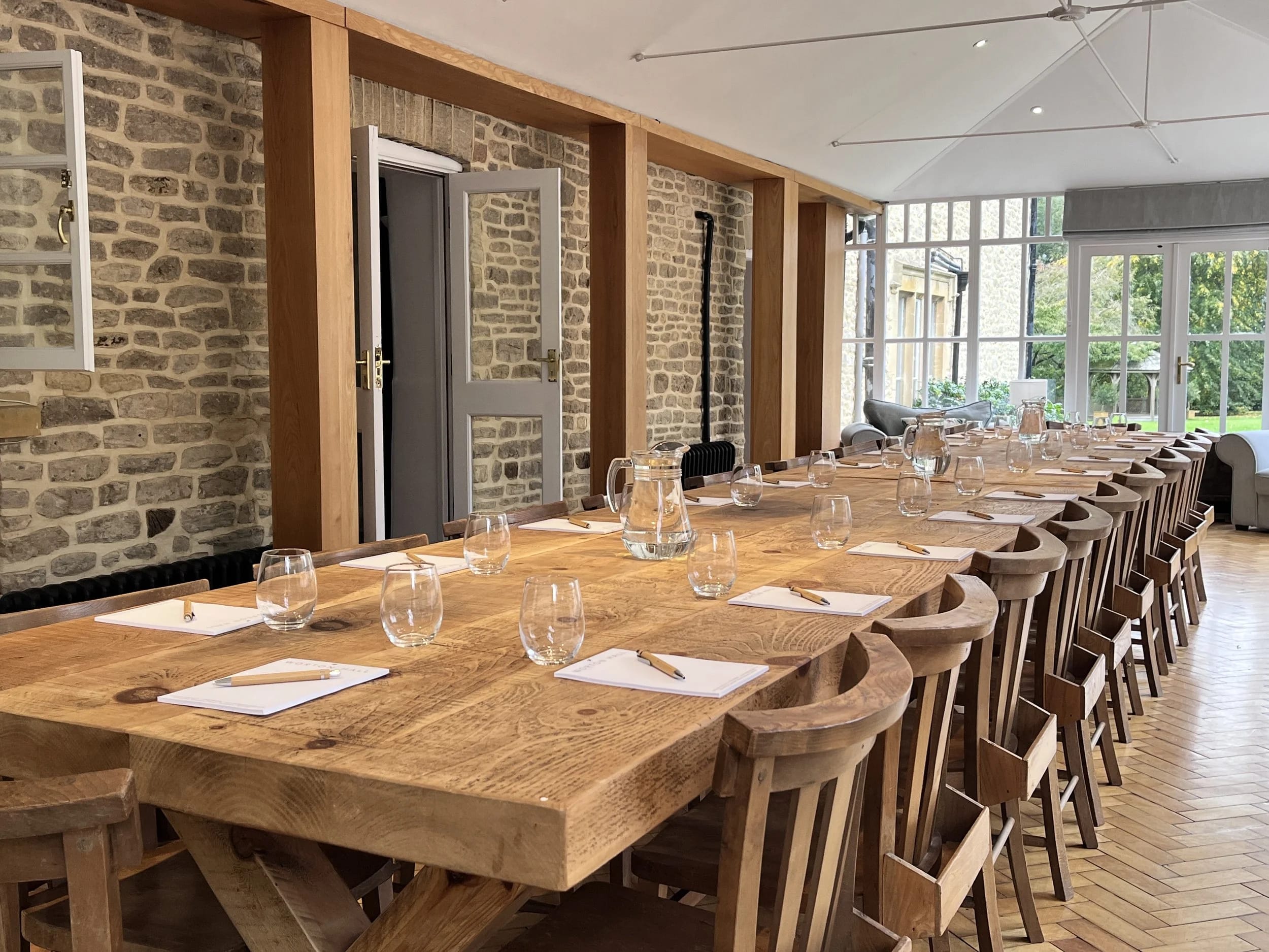 Farmhouse boardroom, rustic wood table, meeting, workshop