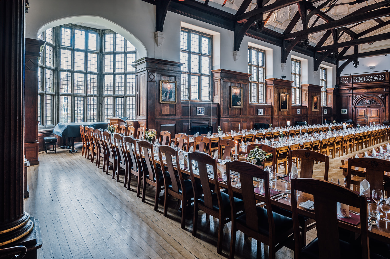 Elegant banquet hall at Selwyn College with wooden beams, perfect for corporate events. - Banner