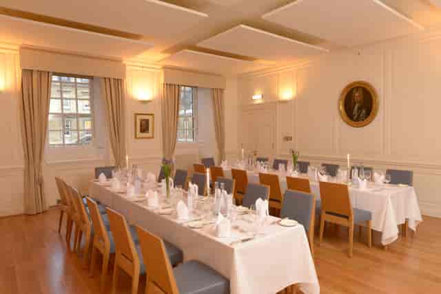 Elegant dining setup in Trinity Hall for formal events and receptions.