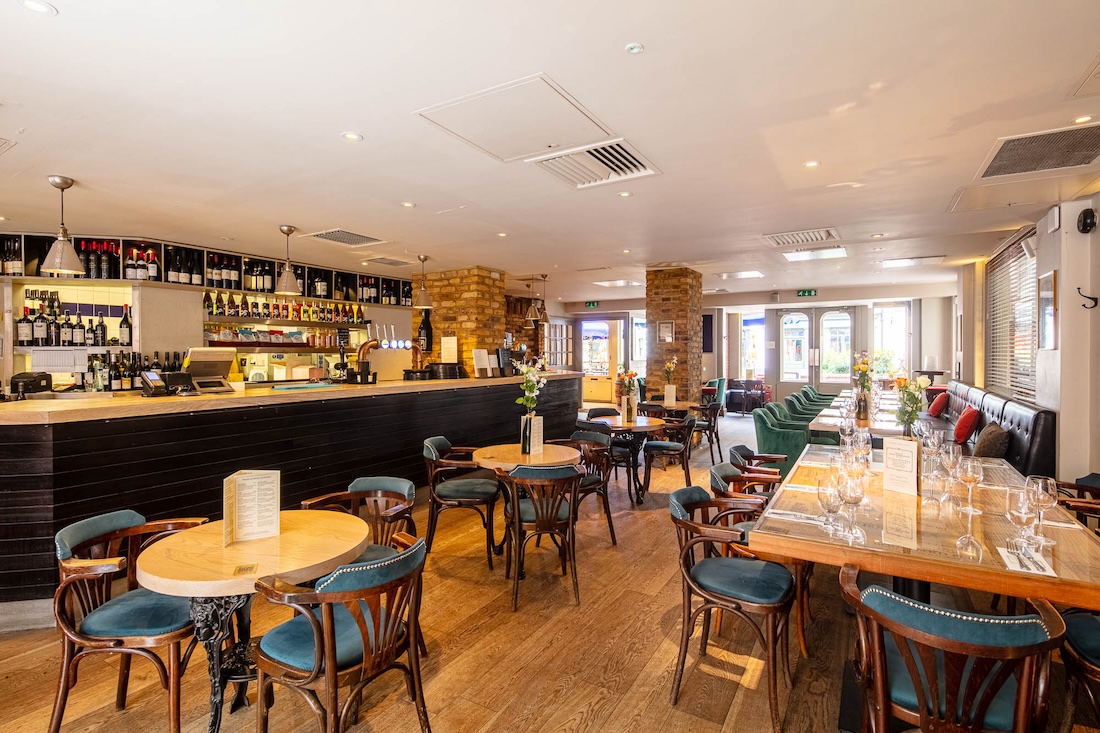 Stylish modern venue in Truckles, warm wood accents ideal for intimate events.