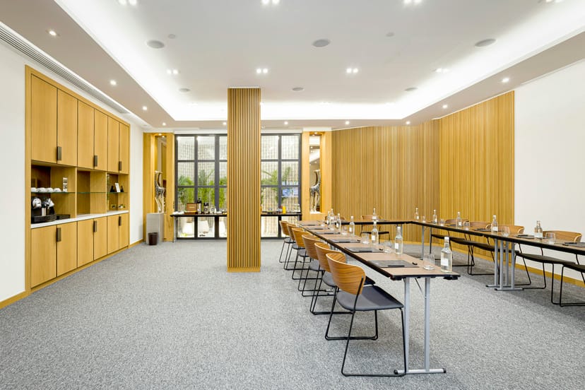 Modern meeting room at H10 London Waterloo with stylish design, perfect for conferences.