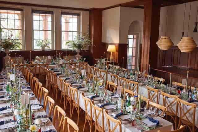 Long-table banquet in wood-paneled villa, perfect for private dining and micro-wedding events.