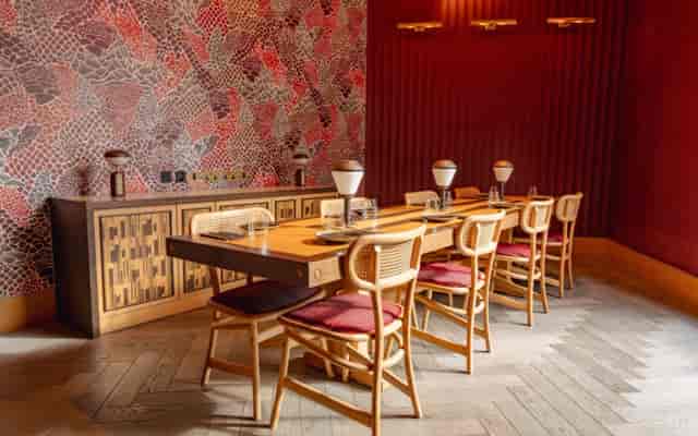 UBA Restaurant private dining room with patterned wallpaper for business meetings and VIP events.
