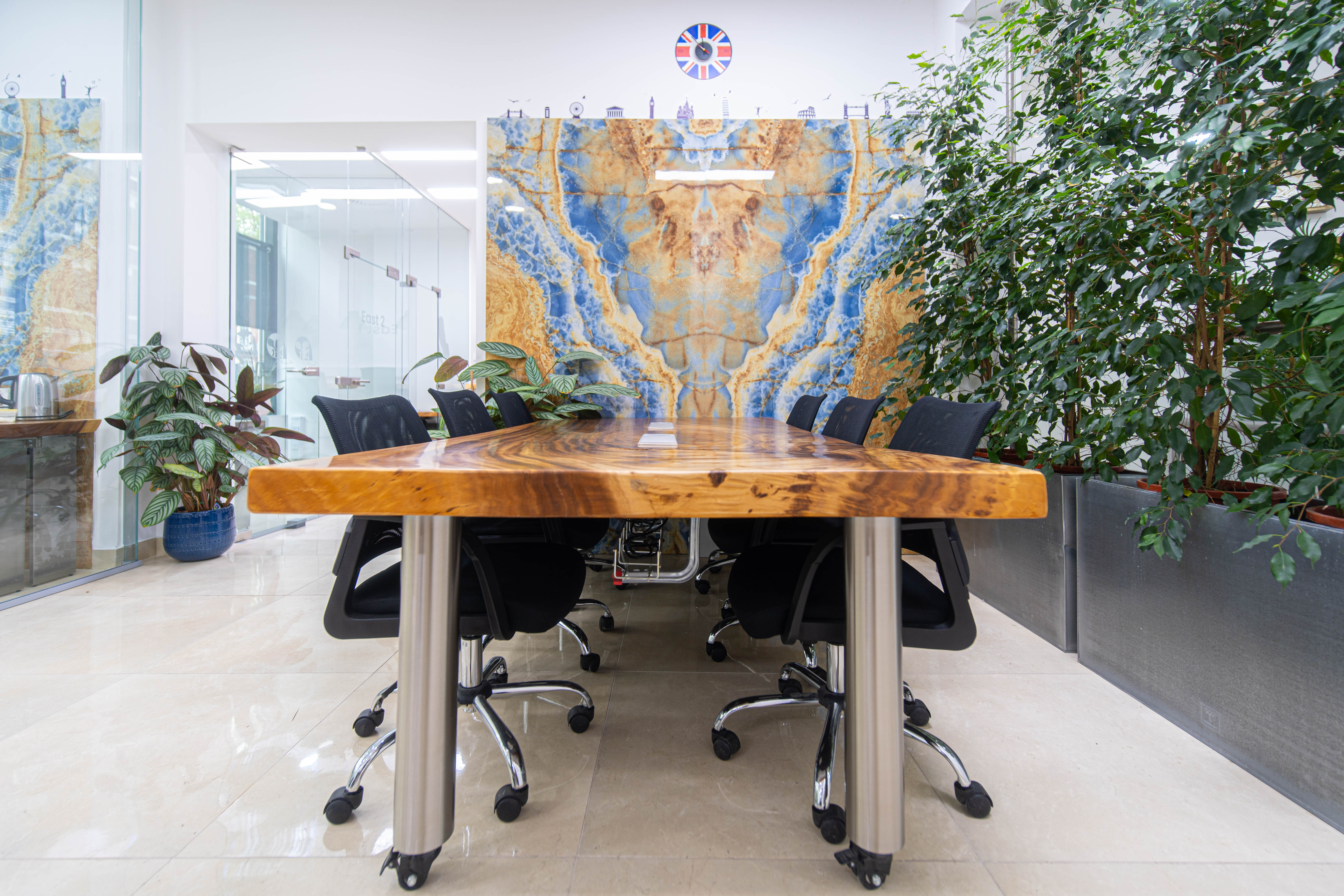 APEX Boardroom, live-edge table, onyx wall, executive meeting, client presentation - Banner