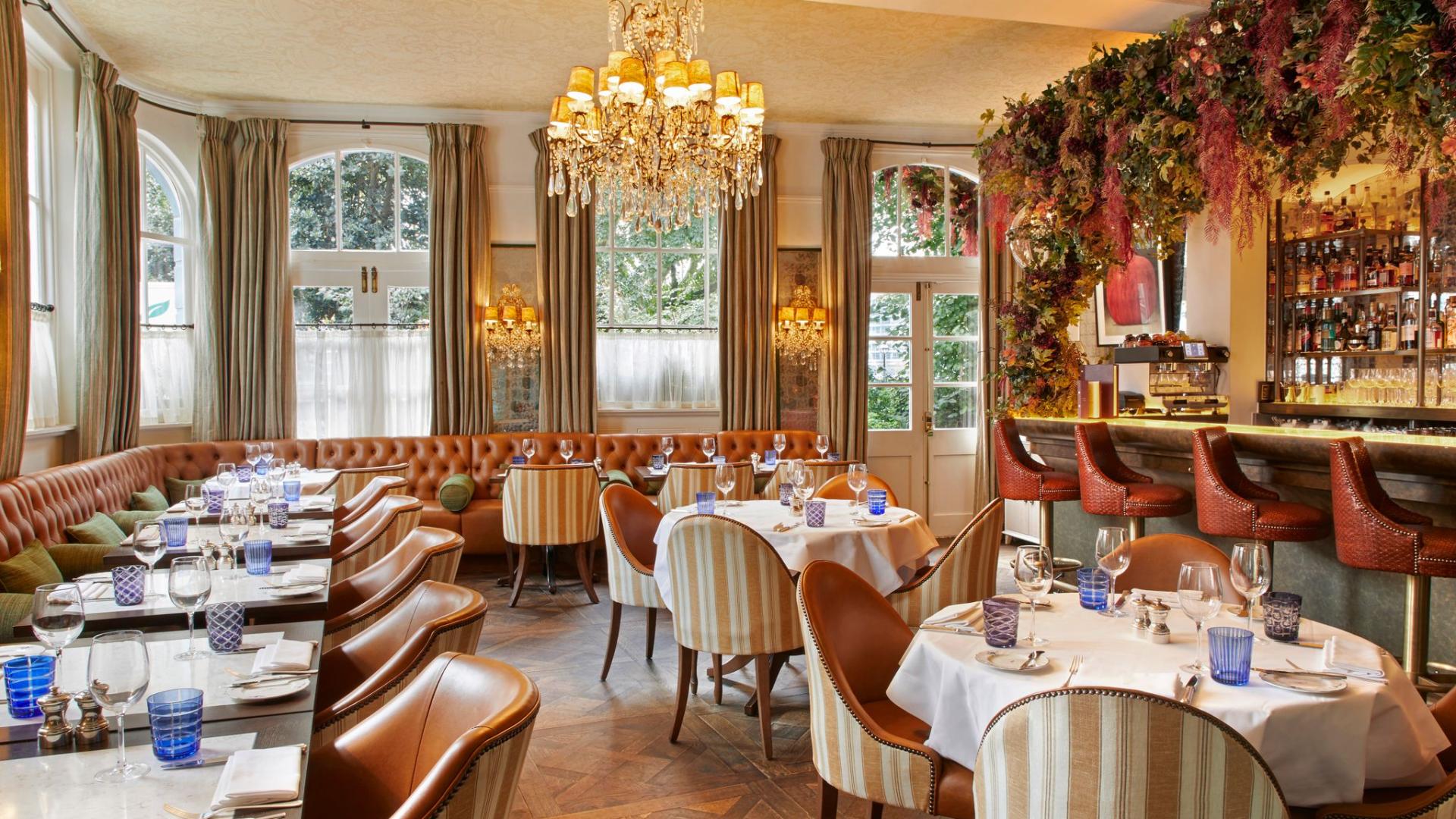 Elegant Rex Rooms event venue, chandeliers, floral decor, reception space - Banner