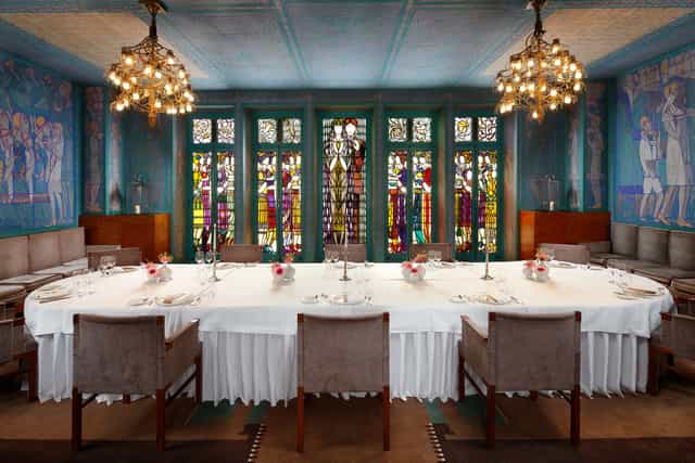 Elegant art'otel Amsterdam dining, stained glass, corporate event