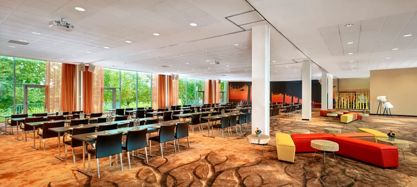 Amsterdam conference ballroom, natural light, hybrid events