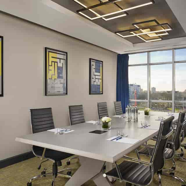 Utrecht board meeting, modern room, executive event